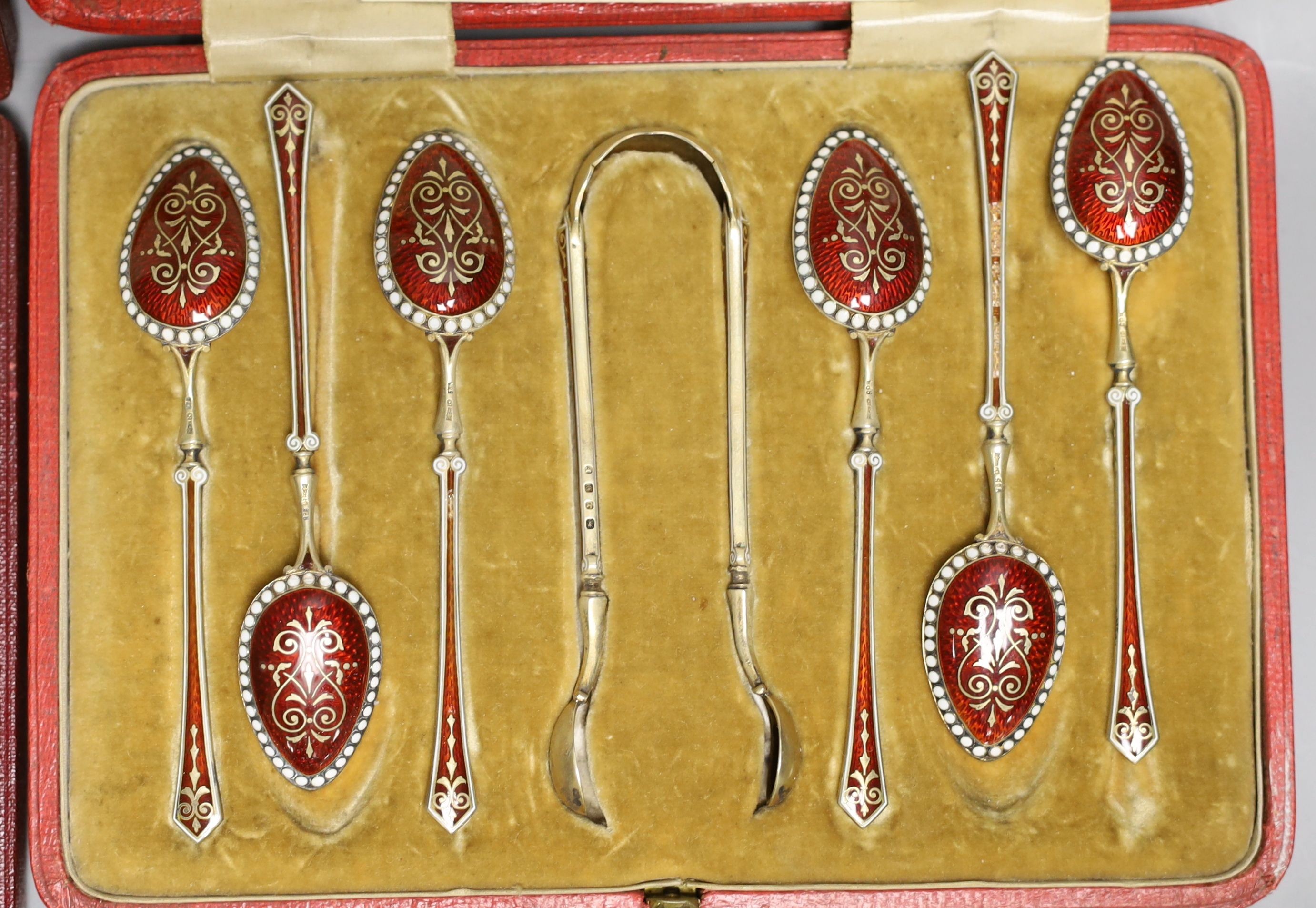 Two cased sets of six silver teaspoons including Art Deco and a cased set of Scandinavian gilt white metal and enamel coffee spoons(a.f.0, a silver sugar caster, pair of silver tongs and a Georgian silver caddy spoon.